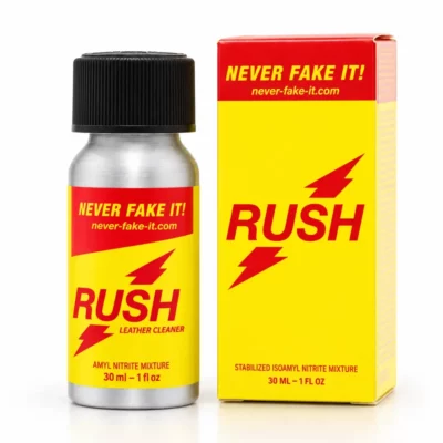 Poppers Rush Pocket Amyl Never Fake It 30 ml, flacon aluminium argenté avec étiquette jaune et rouge tenu dans une main
